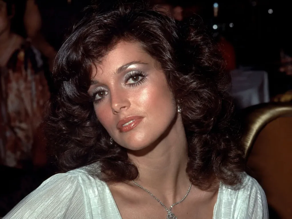 Woman wearing glamorous disco makeup in the late 1970s