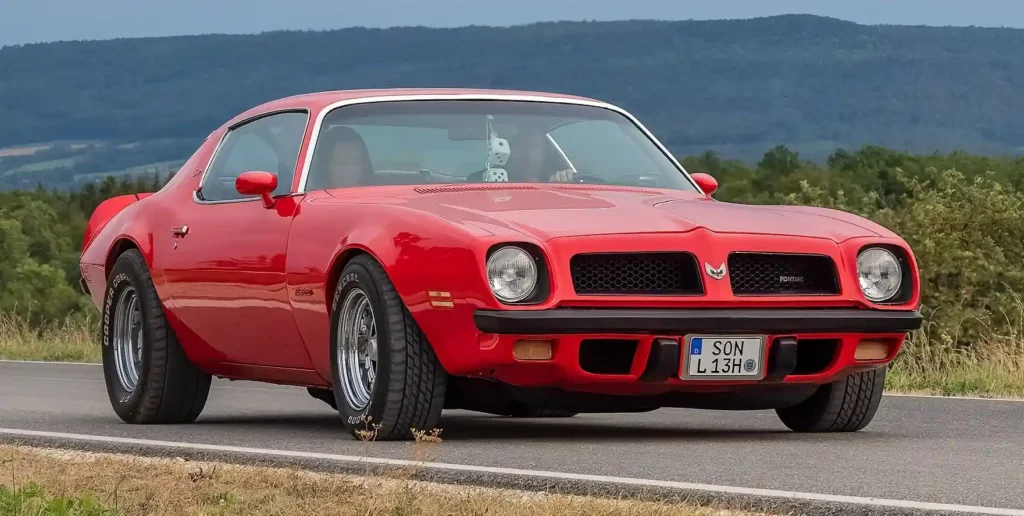 a red Pontiac Trans Am of 1975